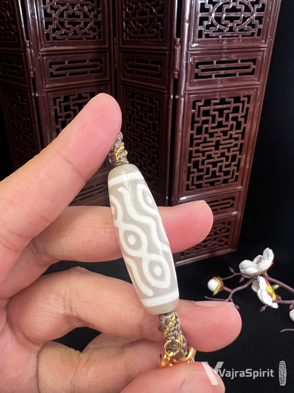 Phoenix Eye & Nine-Eyes with Swastika Conch Silver Pendant